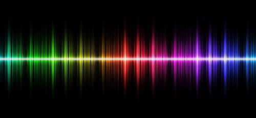 image of a rainbow coloured soundwave on a black background